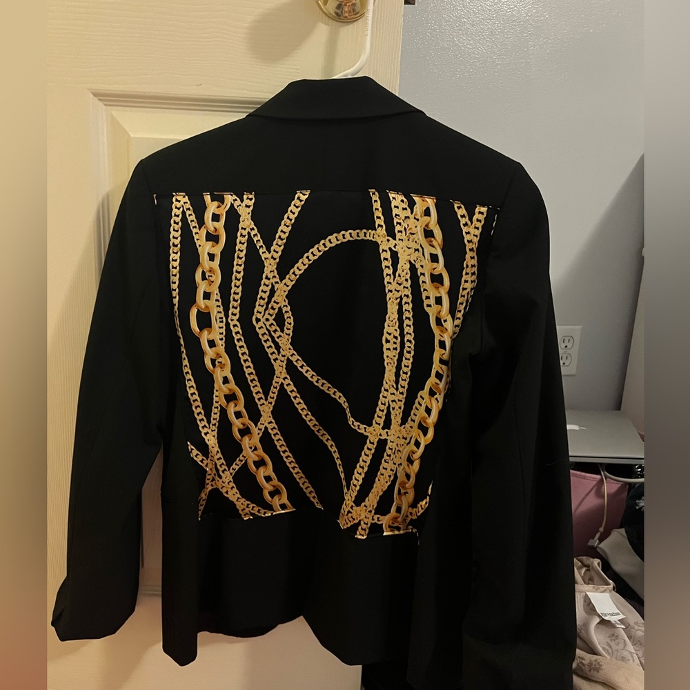 Black blazer with gold chains on back